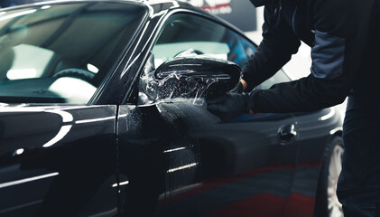 Professional car detailing center - making cars shiny and well maintained. High quality photo