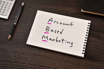 There is notebook with the word Account Based Marketing.It is as an eye-catching image.