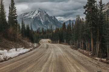 road in the mountains in the Canadian Rocky Mountains in Alberta Canada, near Canmore and Banff 