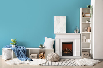 Interior of living room with florariums, shelves and fireplace