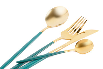 Golden set of cutlery with blue handles on white background