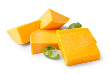 Pieces of tasty cheddar cheese on white background