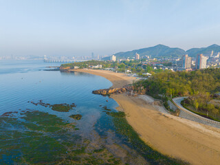 Fototapeta na wymiar Spring seaside scenery of Binhai Road in Dalian, Liaoning province, China