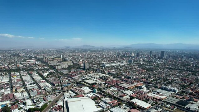 drone shot of heavy pollution in mexico city during winter
