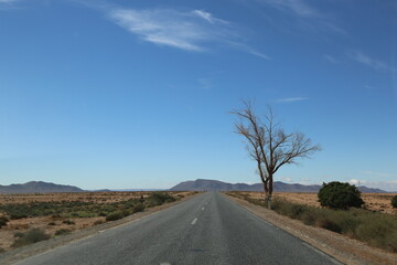 Road to Moroccan Sahara. open road between Guelmim and TanTan city 