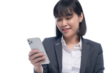 working woman wearing a suit is using a smartphone