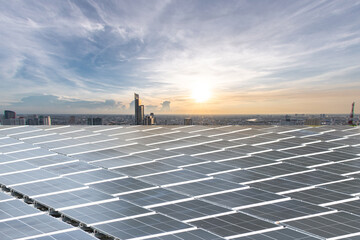 Solar panel and modern city skyline.
