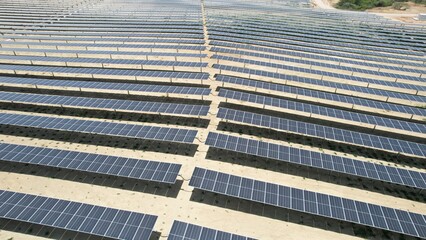 pv plant or solar farm seen from drone or aerial footage