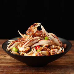 The claws of crabs are on the dining table(Lobster Claws), pincers,a delicacy marinated with spices, Chinese food