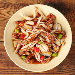 The claws of crabs are on the dining table(Lobster Claws), pincers,a delicacy marinated with spices, Chinese food