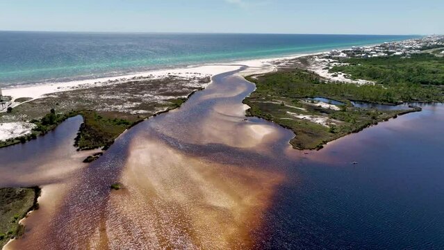 Lake Powell Florida Coastal Dune Lake Outfall empties into Gulf of Mexico aerial captured in 5k
