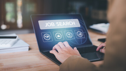 Man using tablet to search for jobs online ,career search ideas, recruitment , HR search, unemployed person ,new graduates ,job shortage ,economic downturn ,unemployment ,dismissal