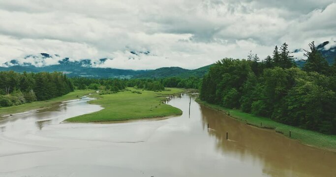 Aerial orbit over estuary landscape