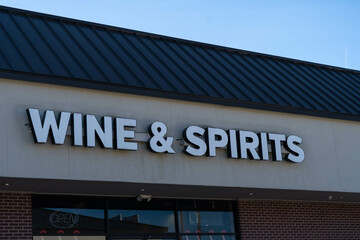 Generic Wine and Spirts sign above a storefront.