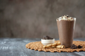 Coffee and cream frappe. With coffee beans and concept presentation.