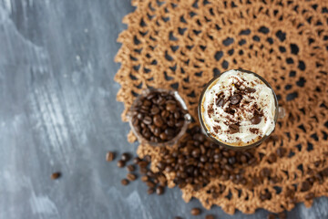 Coffee and cream frappe. With coffee beans and concept presentation.