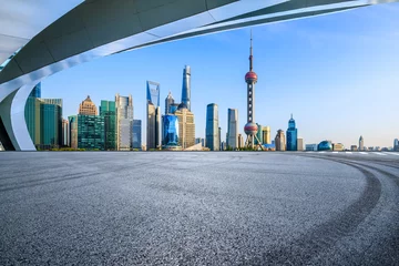 Fototapete Asphalt road and city skyline with modern buildings in Shanghai, China. © ABCDstock