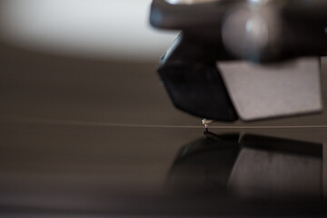 Close-up vintage vinyl record player needle.