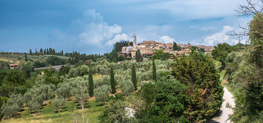 Fototapeta na wymiar cityscape of San Quirico d'Orcia in the Tuscany region, Siena province, central Itly - Europe. historic Romanesque church of San Quirico d'Orcia
