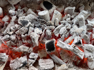 burning charcoal in a fire