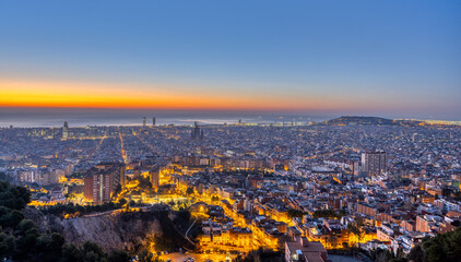 Fototapeta na wymiar Barcelona with the Mediterranean Sea before sunrise