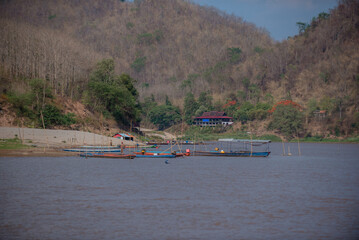 Obraz premium Fishing boats on the Mekong River.