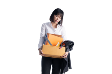 Working woman wearing a suit is holding a toolbox. Fired