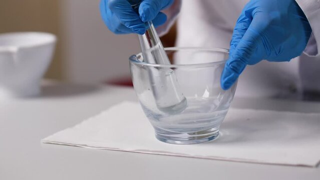 Laboratory apparatus and their uses are demonstrated by a pharmaceutical technical assistant, medicine experiment, clinical analysis, research, medical illustration