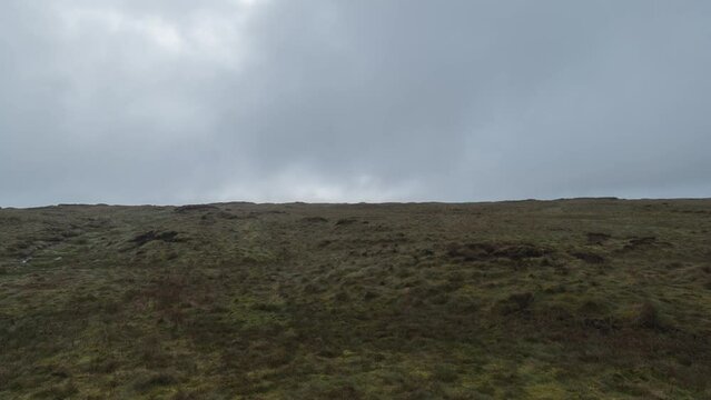 Timelapse of moving clouds in Peak district black hill, England