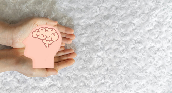 Human hand hold care brain health therapy, alzheimer, cancer, stroke, parkinson, disease, dementia, donation, surgery, cerebral haemorrage, encephalitis, insurance, hospital.world mental health day