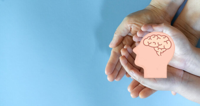 Human hand hold care brain health therapy, alzheimer, cancer, stroke, parkinson, disease, dementia, donation, surgery, cerebral haemorrage, encephalitis, insurance, hospital.world mental health day