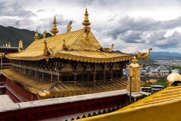 Fototapeta na wymiar the roof architecture of Songzanlin Temple also known as the Ganden Sumtseling Monastery, is a Tibetan Buddhist monastery in Zhongdian city( Shangri-La), Yunnan China.
