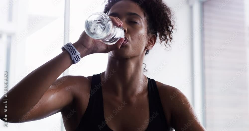 Sticker Woman drinking water, fitness and relax after workout, sport and tired with hydration, health and wellness. Female athlete resting after exercise routine in gym, sweating and drink h2o from bottle