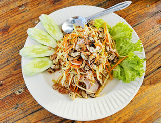 Thai street food, Thai Spicy Mango salad, Som tum, Thai Spicy salad.