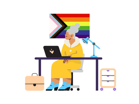 A non-binary or gender neutral person sitting at a desk , working in a home office.