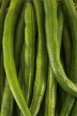 Green beans are raw. Close up. Healthy eating.
