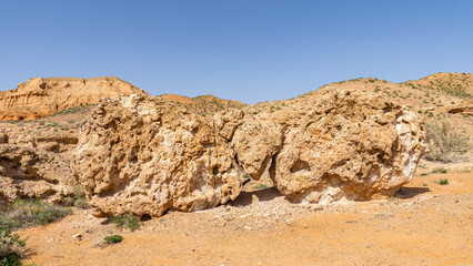 Fototapeta na wymiar weathered sandy rocks. desert rocks