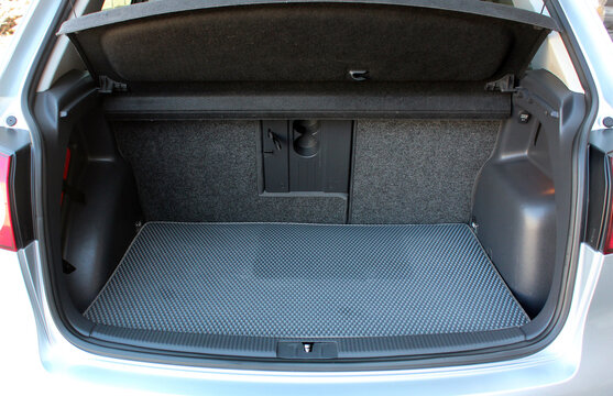 Modern hatchback car open trunk. Car boot is open. A lot of space for coffers and bags.