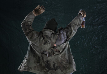 drunk homeless man on dirty background