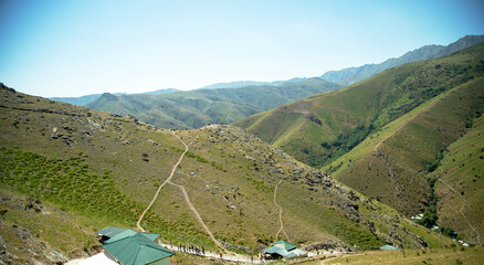 Contrasting landscape with meadows in the mountains