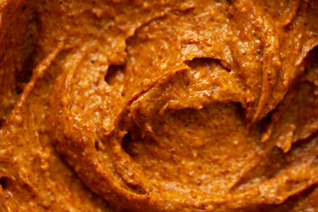 Baby food, vegetable puree close-up. Apple-carrot puree chopped in a blender. Background texture of food for newborn children.