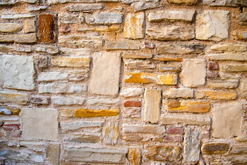 Ancient medieval stone wall texture background.