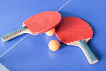 Ping pong or table tennis background with rackets
