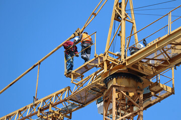 Fototapeta na wymiar Tower crane at the construction site