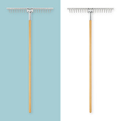 Steel metal garden rake with wooden grip, top view isolated on white background. Spring time concept for home garden or vegetable garden and lawn care. Gardening Tool Equipment for removing leaves.