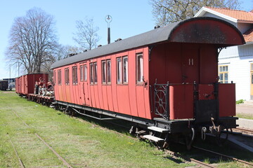 Obraz premium Vadstena is a locality and the seat of Vadstena Municipality, Östergötland County, Sweden. Located on the eastern shore of Lake Vättern. Old Train station and trains in Vadstena. 