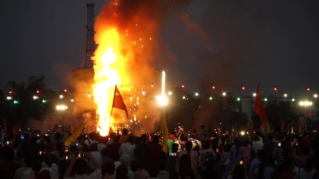 October 19th 2022, Dehradun, Uttarakhand, India. Ravana, Kumbkarana and Meghnath effigies on fire during Vijayadashmi festival fair with people all around.