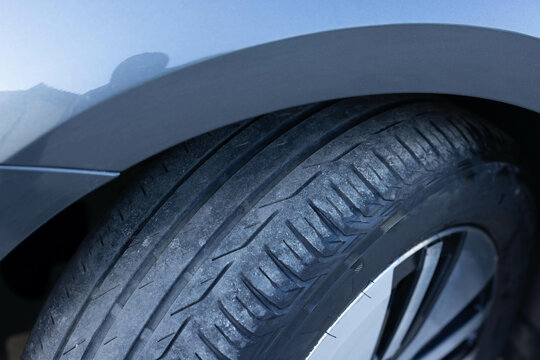 Fuel efficient electric car tires. Luxury car wheel close up