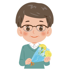 黄色いカーネーションの花束を持った中年男性