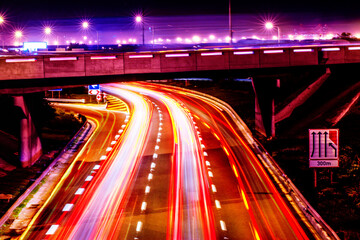 Night lights, city and highway with driving infrastructure in cape town with road travel...